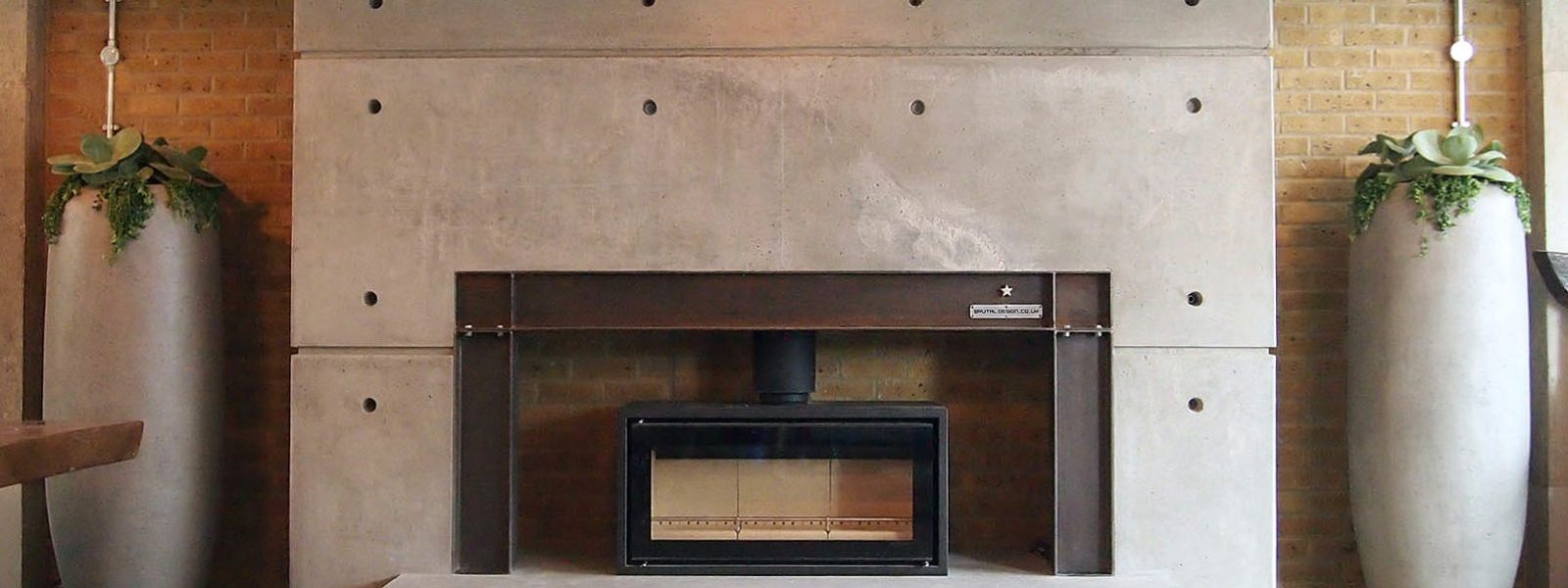 Concrete and steel fireplace By Brutal Design