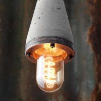 "Industrial concrete and steel exposed bulb pendant light" "by Brutal Design"