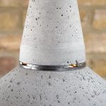 "Concrete and Steel Pendant Light with glass dome lens top section detail" "Steel ring connection detail" "by Brutal Design"