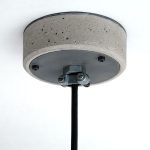 "Concrete Ceiling Rose with cable clamp" "by Brutal Design London"
