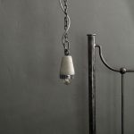 "Industrial concrete and steel exposed bulb pendant"